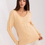 Beżowy sweter z warkoczami i ściągaczami